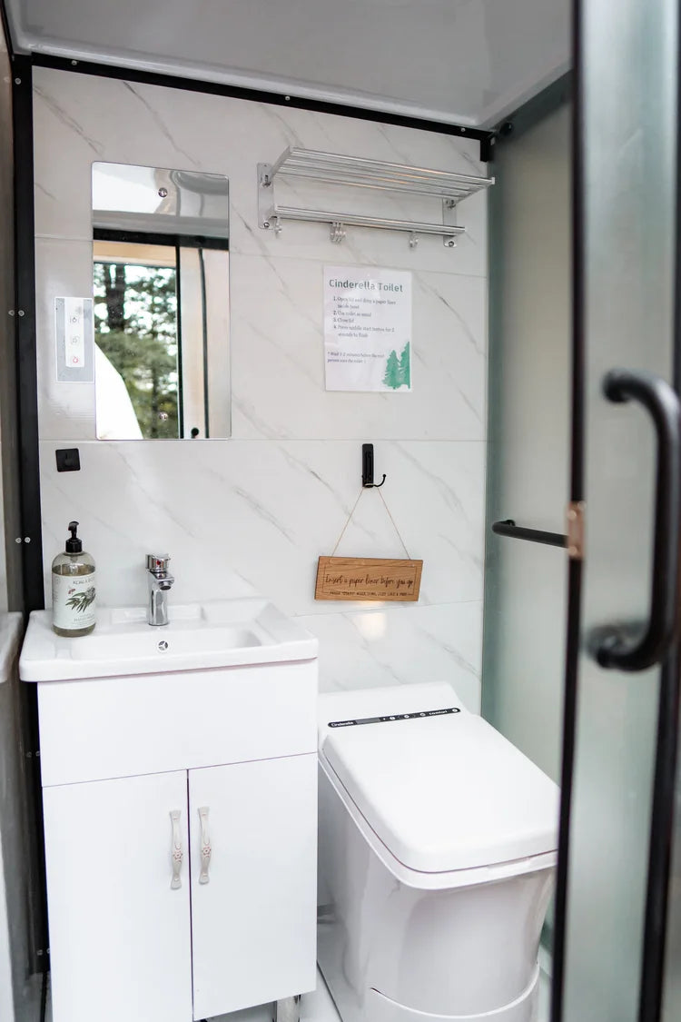 Stand Alone Outdoor Bathroom with Shower + Sink